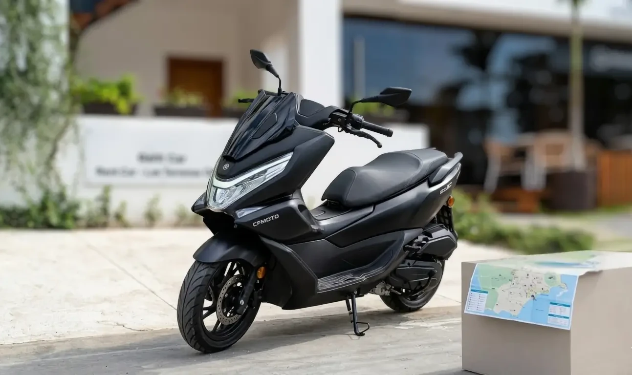 Matte black CF Moto 150cc automatic scooter for rent parked in front of ACT Rent Car office in Las Terrenas.